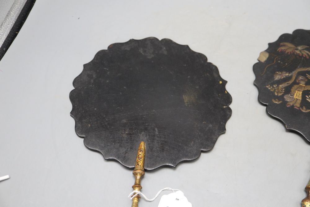 A pair of Japanese lacquered face screens, length 42cm